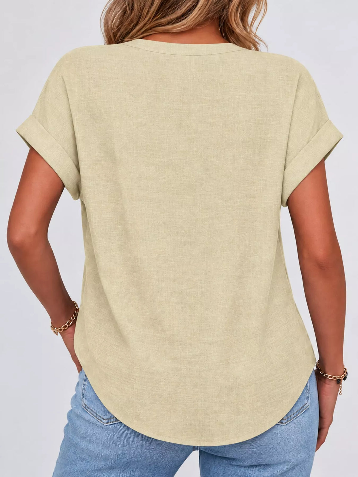 Pale yellow button detail short sleeve blouse, back view