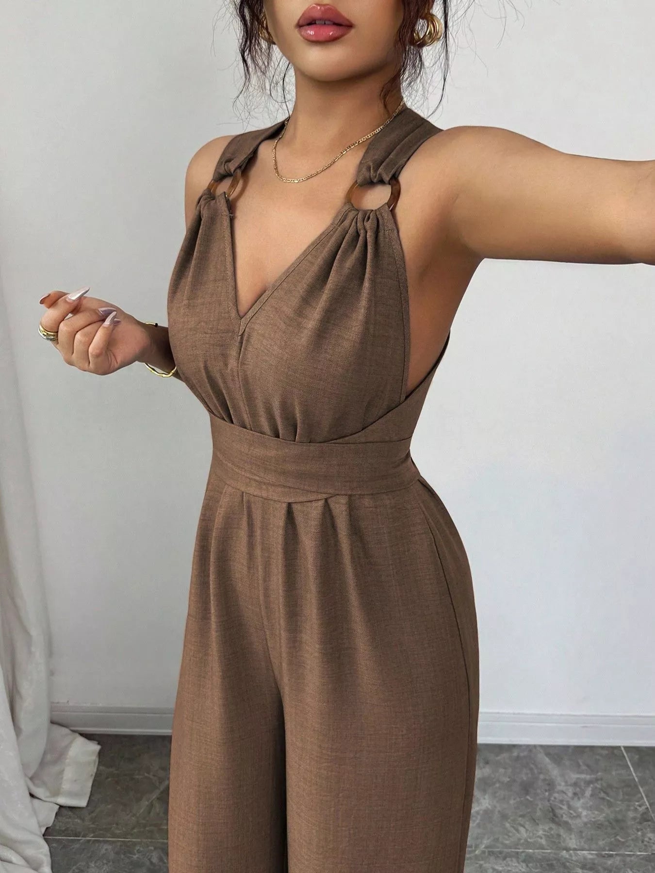 Trendsi Sleeveless V-Neck Wide-Leg Jumpsuit with O-Ring Detail -