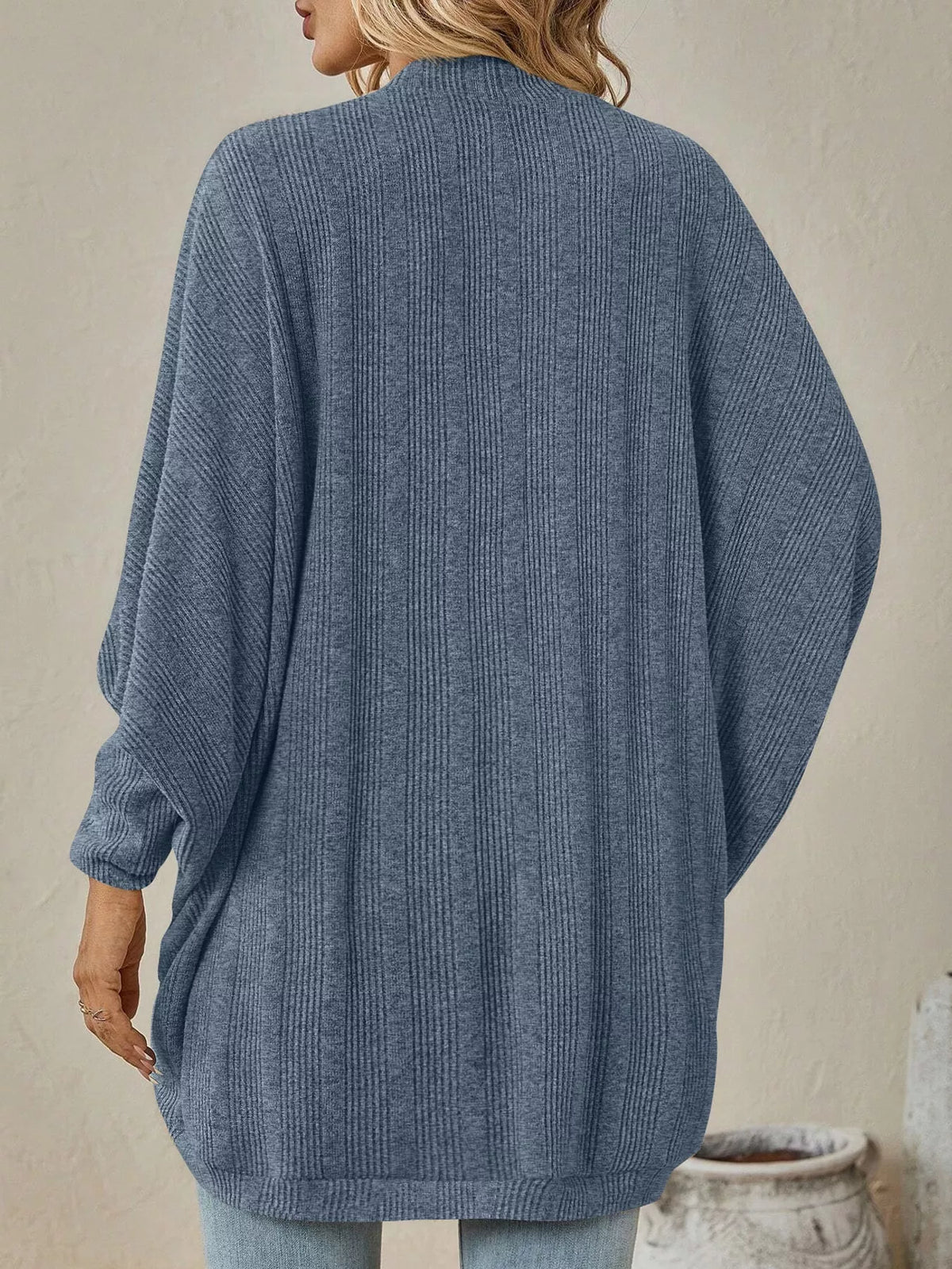 Blue open-front batwing sleeve cardigan, back view