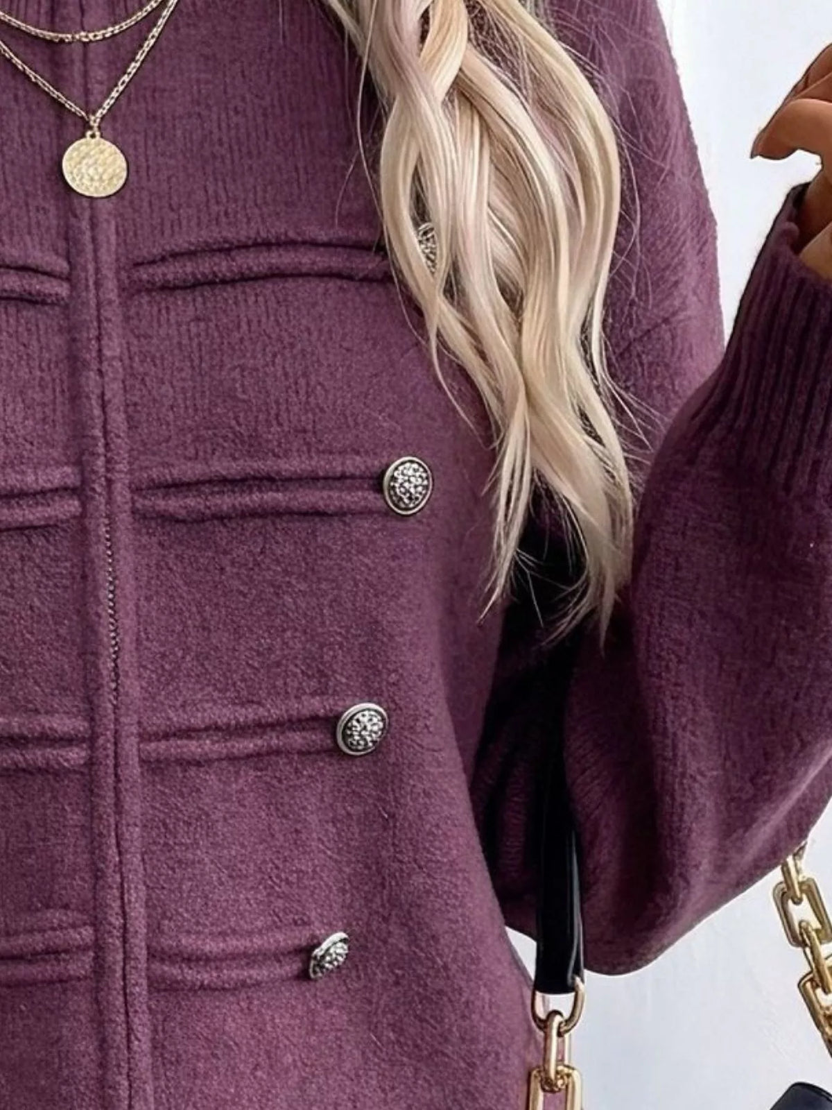 Purple zip-up long sleeve cardigan with decorative buttons, zipper and decorative button detail