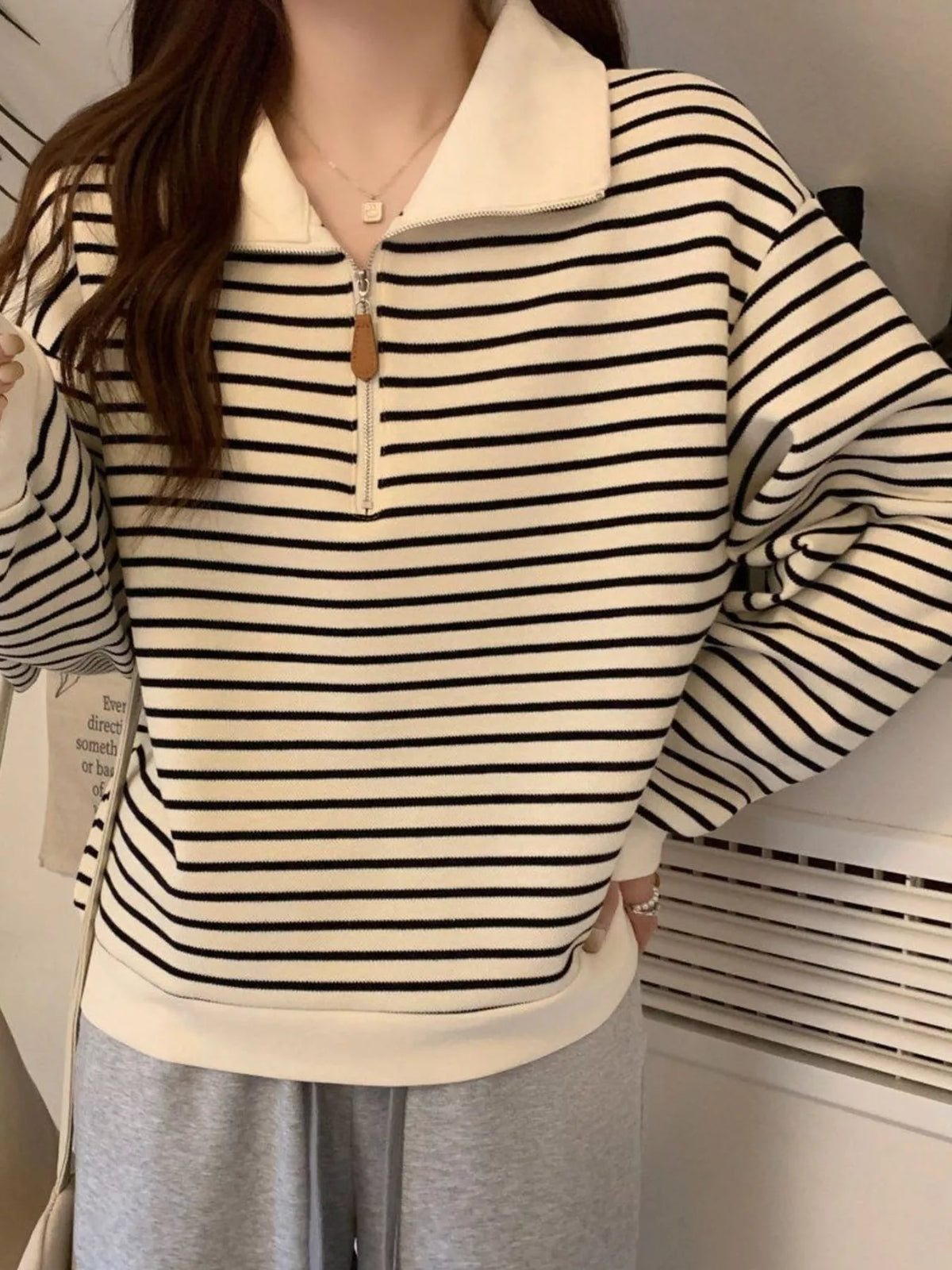 Striped Quarter-Zip Pullover Sweatshirt in cream and black