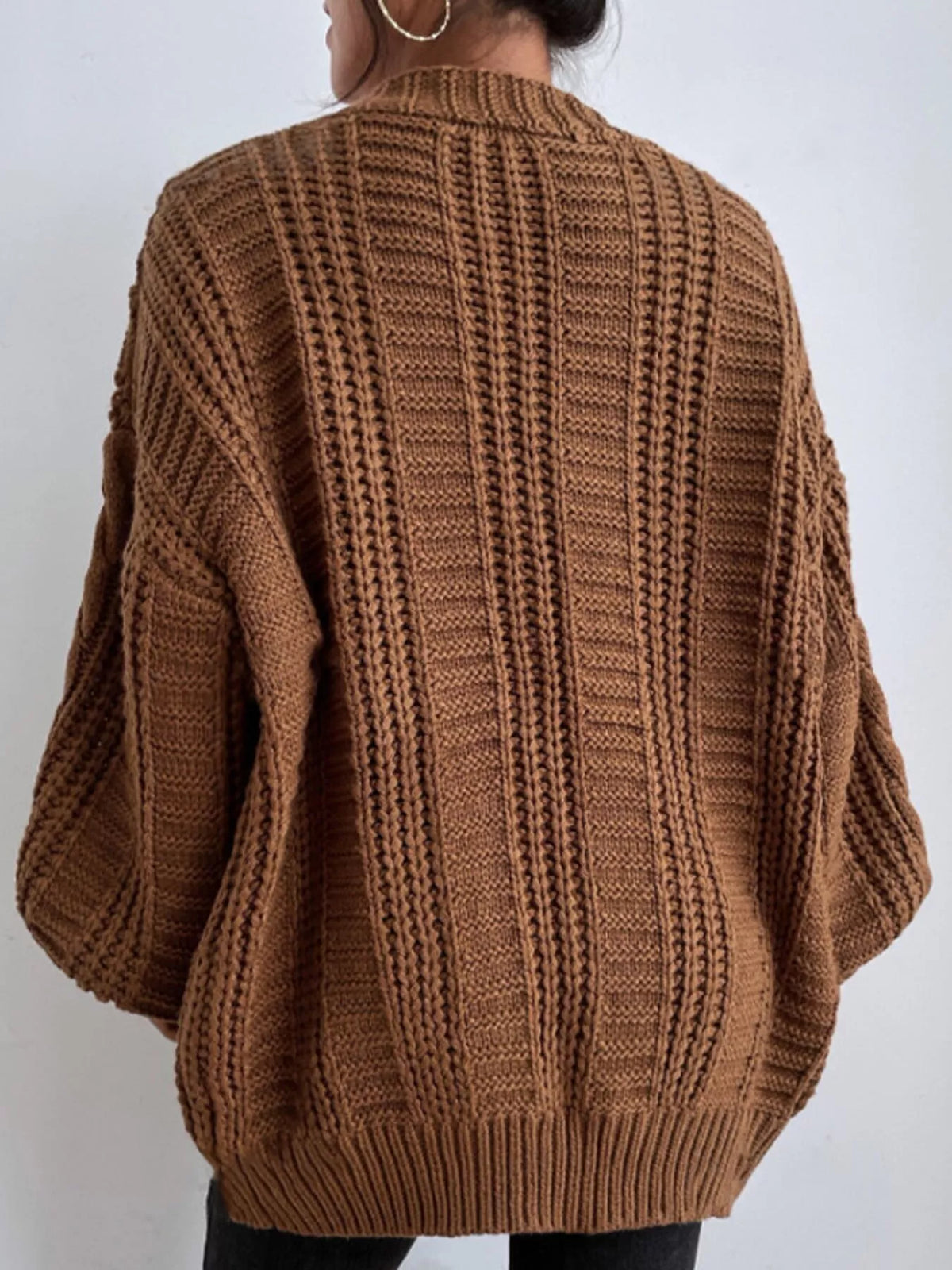 Brown cable knit button-down cardigan, back view
