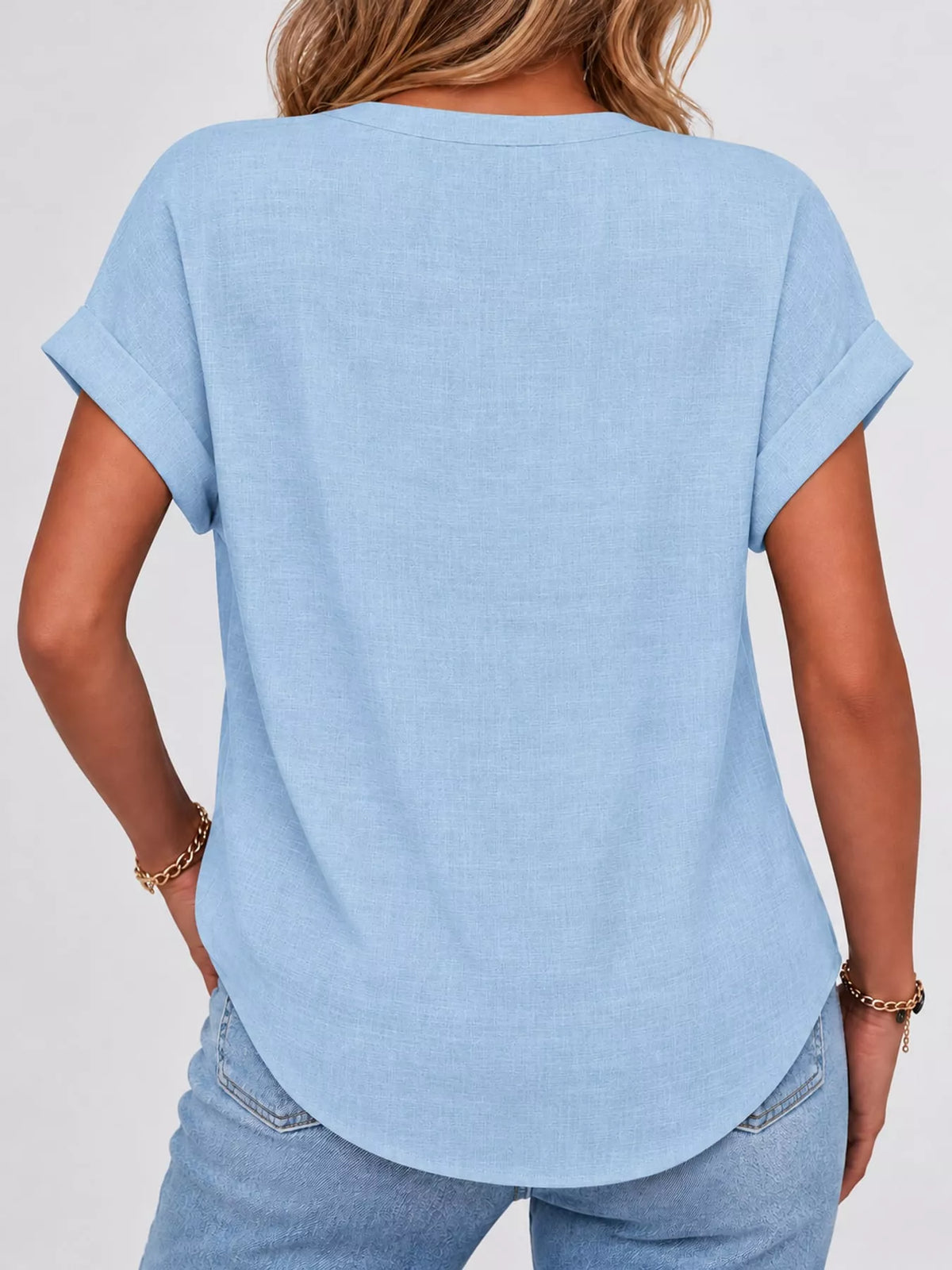Light blue button detail short sleeve blouse, back view