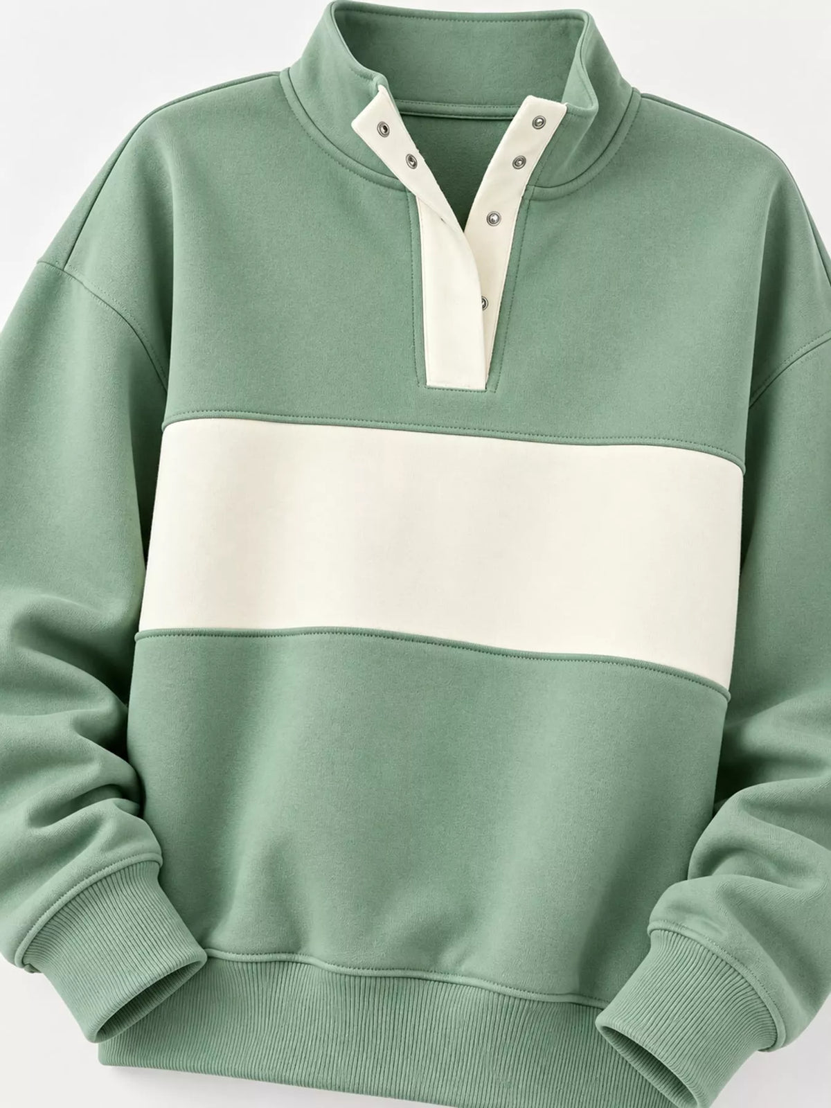 Green and cream color block snap-button sweatshirt, snap neckline, contrast chest panel, cuffs, and hem