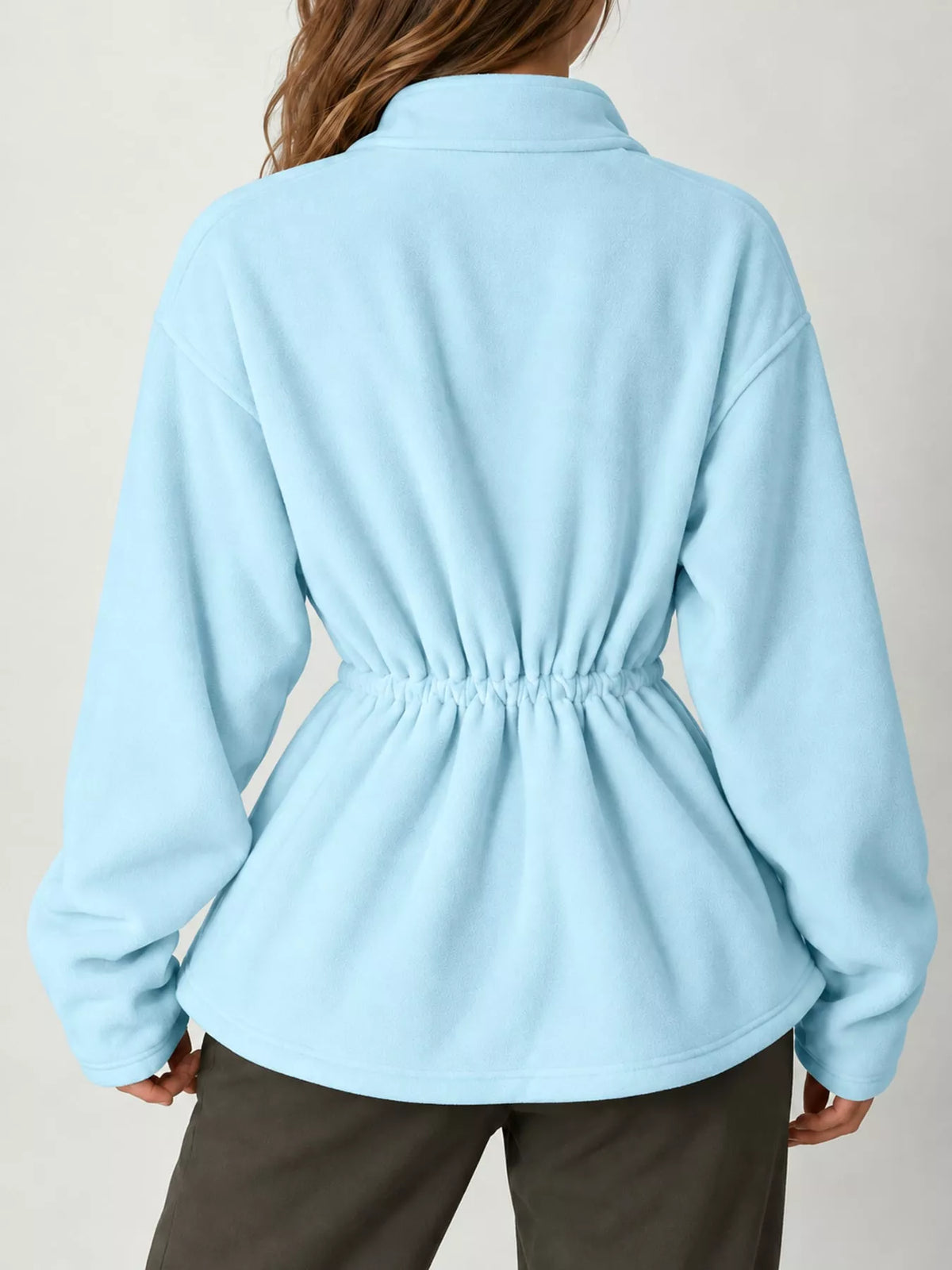 Blue drawstring fleece zip-up jacket, back view