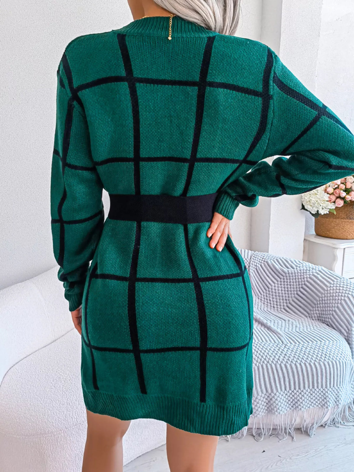 Green windowpane long-sleeve sweater dress, belted back view.