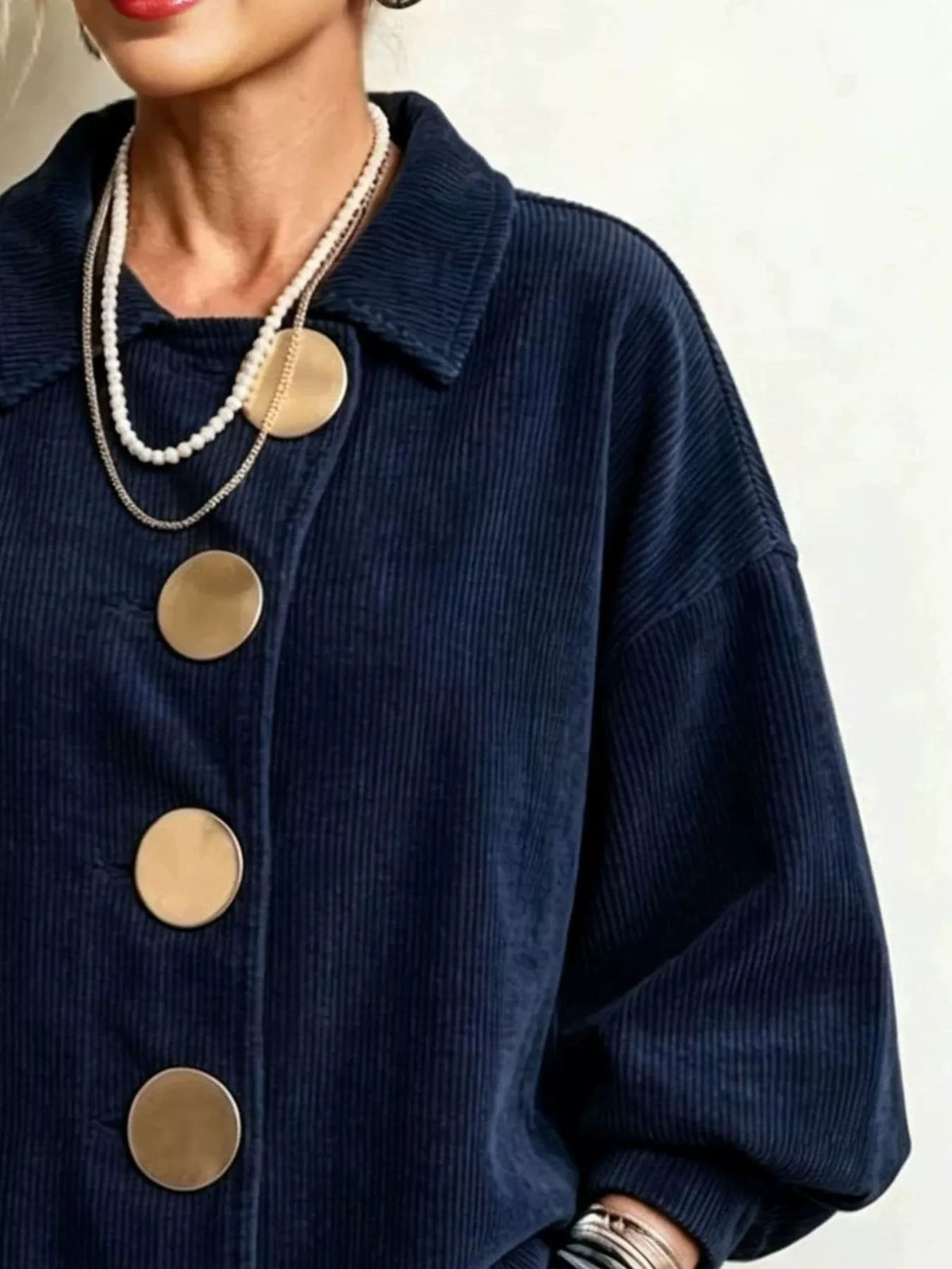 Navy corduroy button-down jacket, collar, gold-tone buttons, and gathered sleeve
