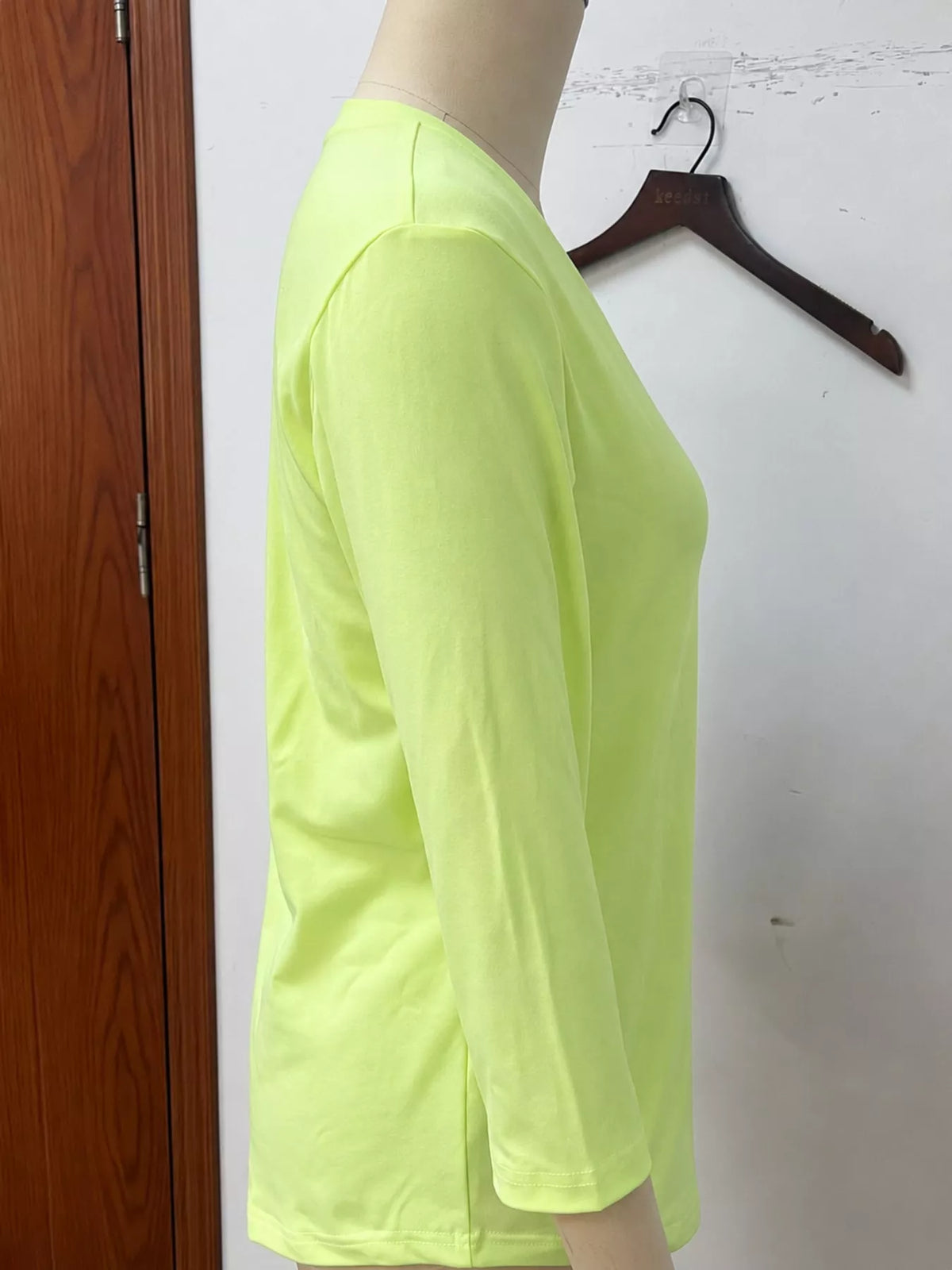 Lime green v-neck half sleeve t-shirt, detail view