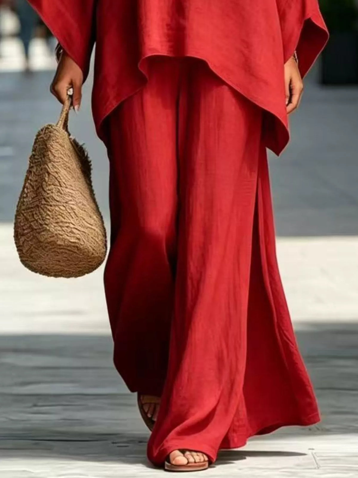Red matching wide-leg pants and top hem detail