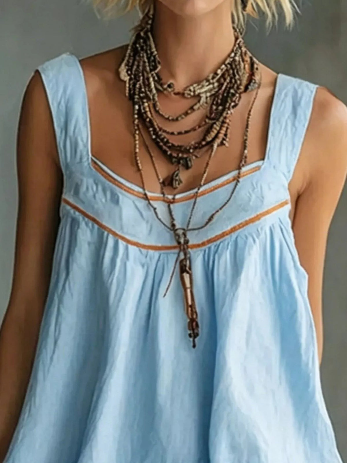 Sleeveless Tiered Mini Dress in blue, bodice detail