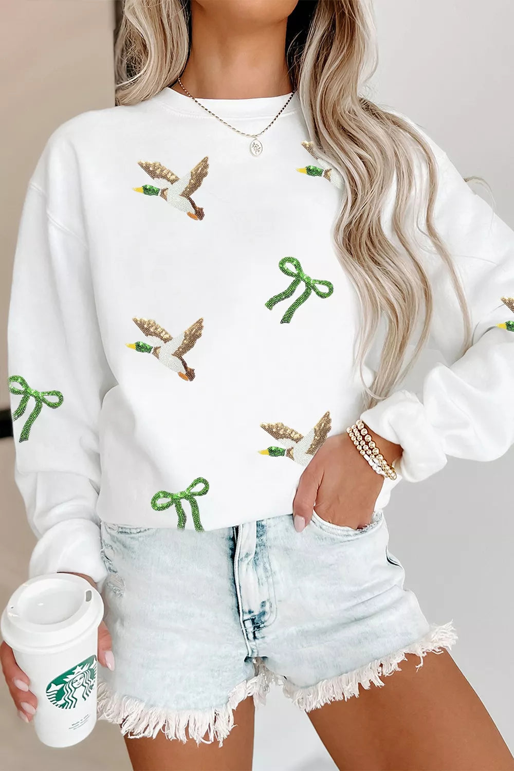 White mallard and bow sequin sweatshirt, front view