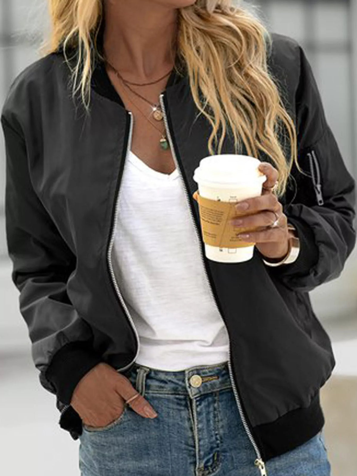 Black zip-up bomber jacket — front view
