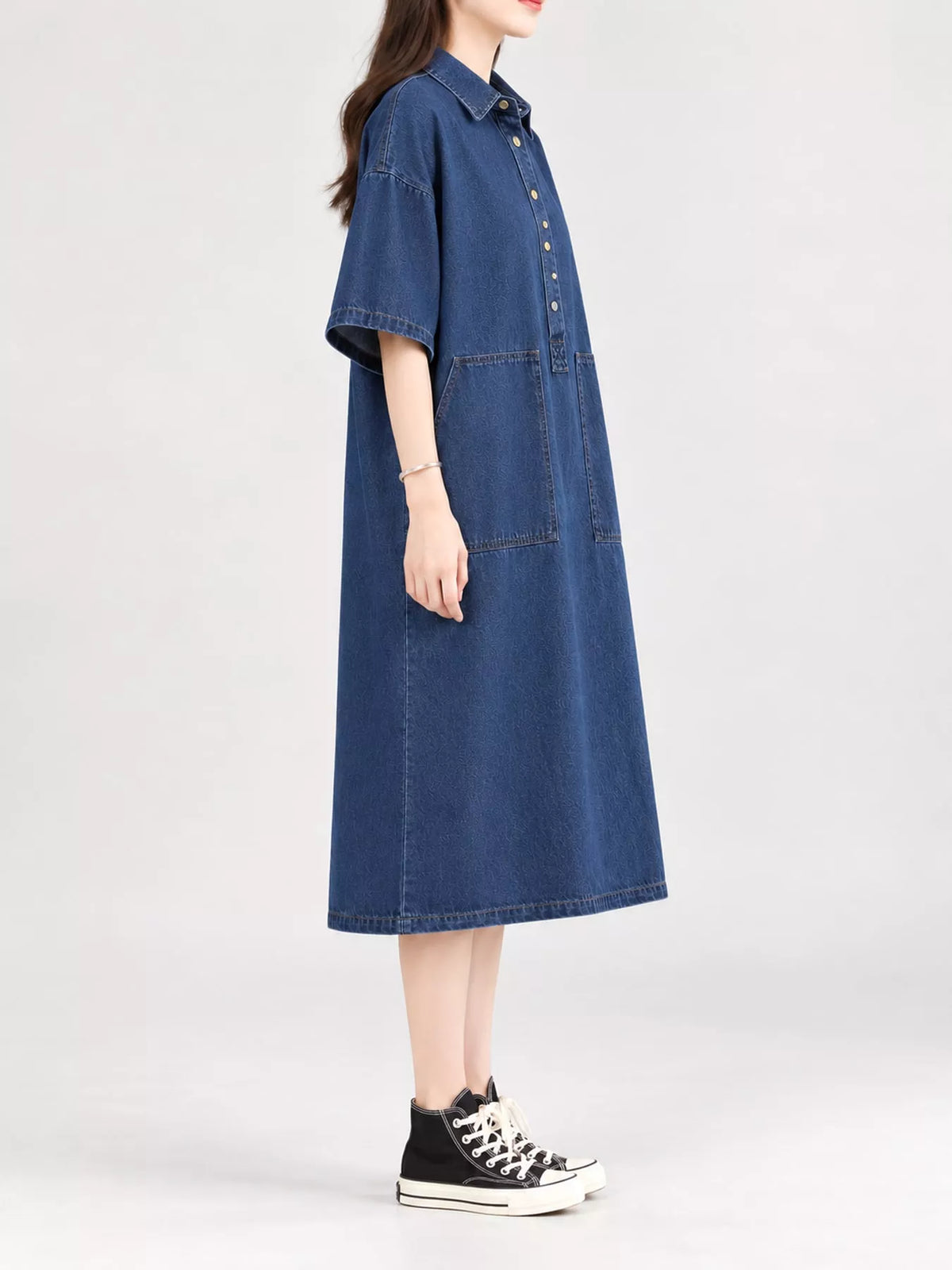 Blue button front denim shirt dress, side view