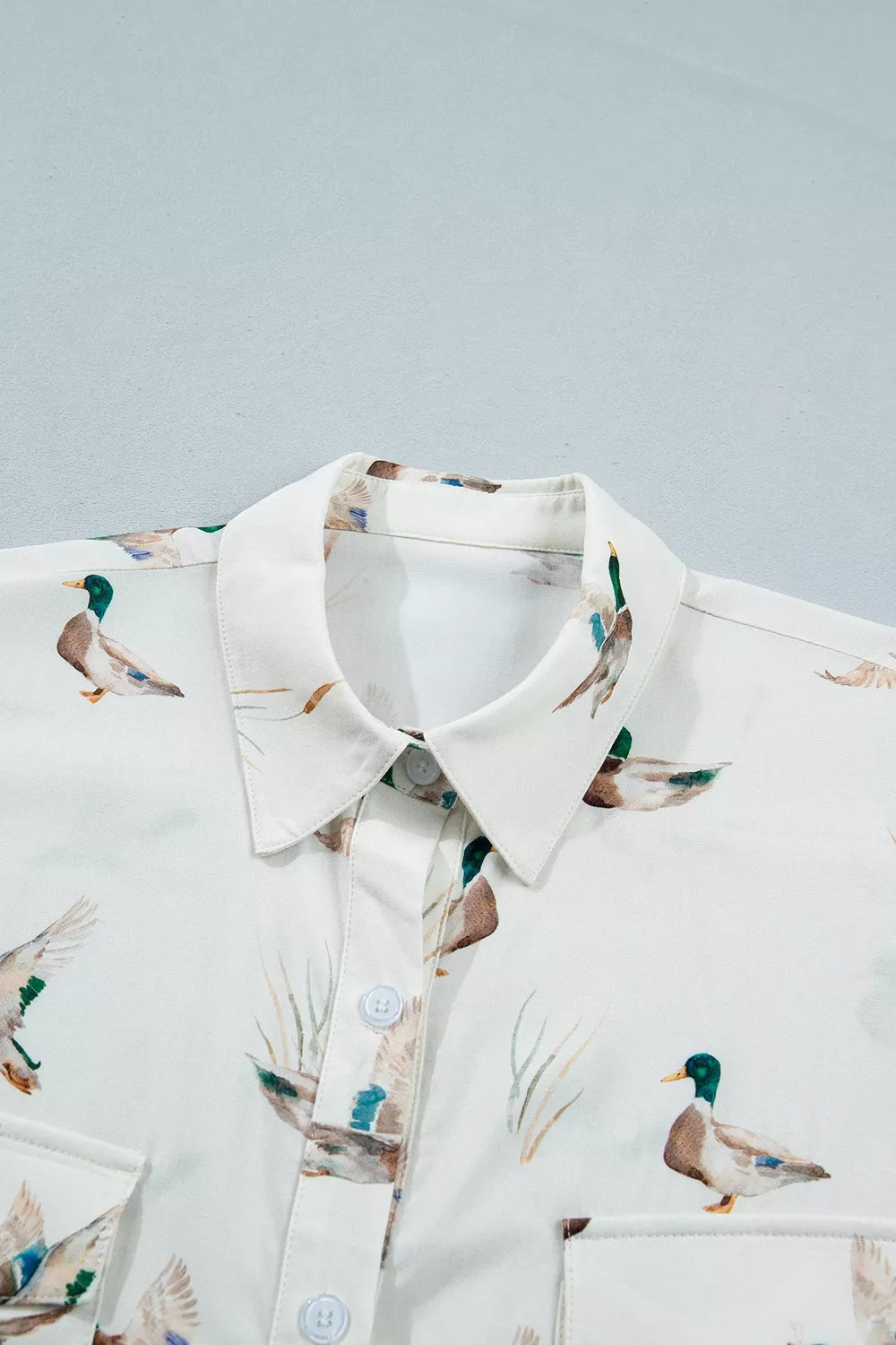 Trendsi Mallard Printed Button Flap Pocket Short Sleeve Shirt -