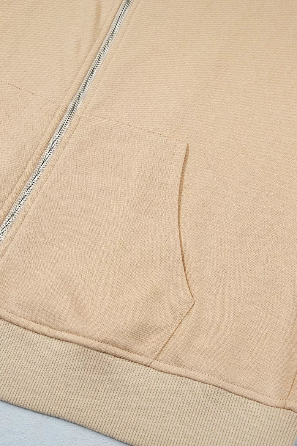 Polka Dot Zip-Up Hoodie in beige, zip detail