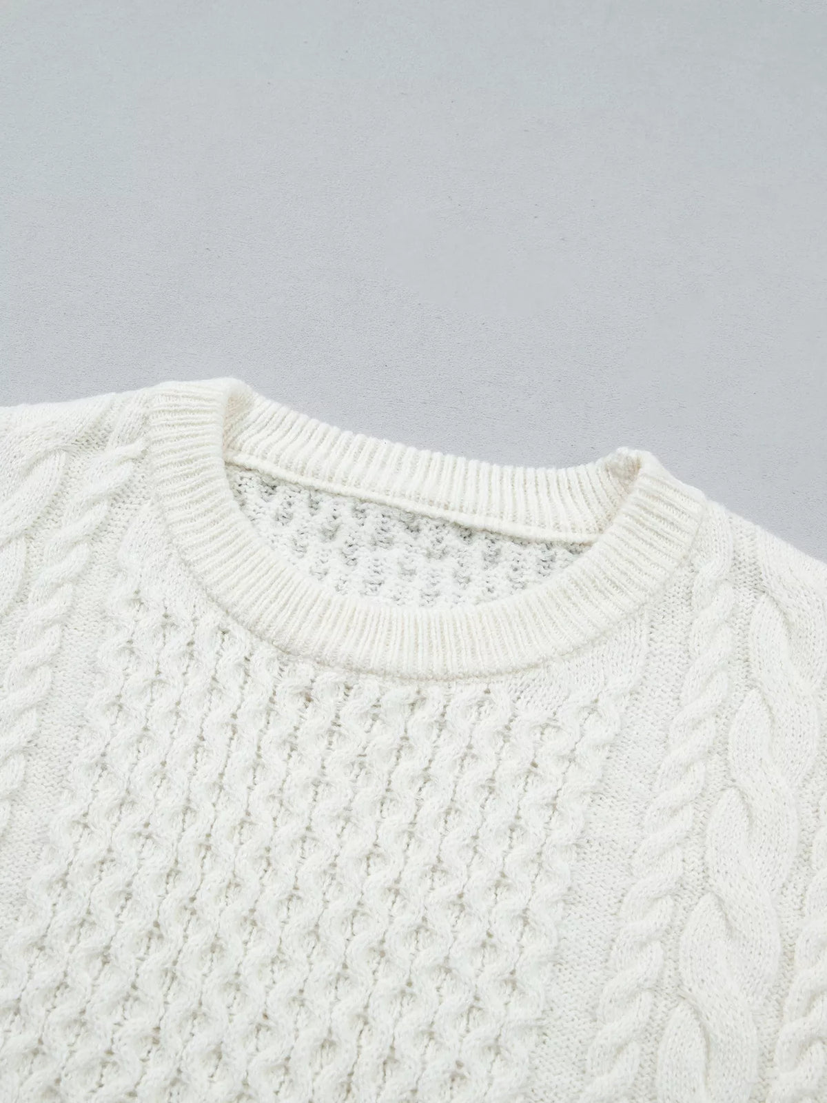 Cable Round Neck Sweater in white, construction detail