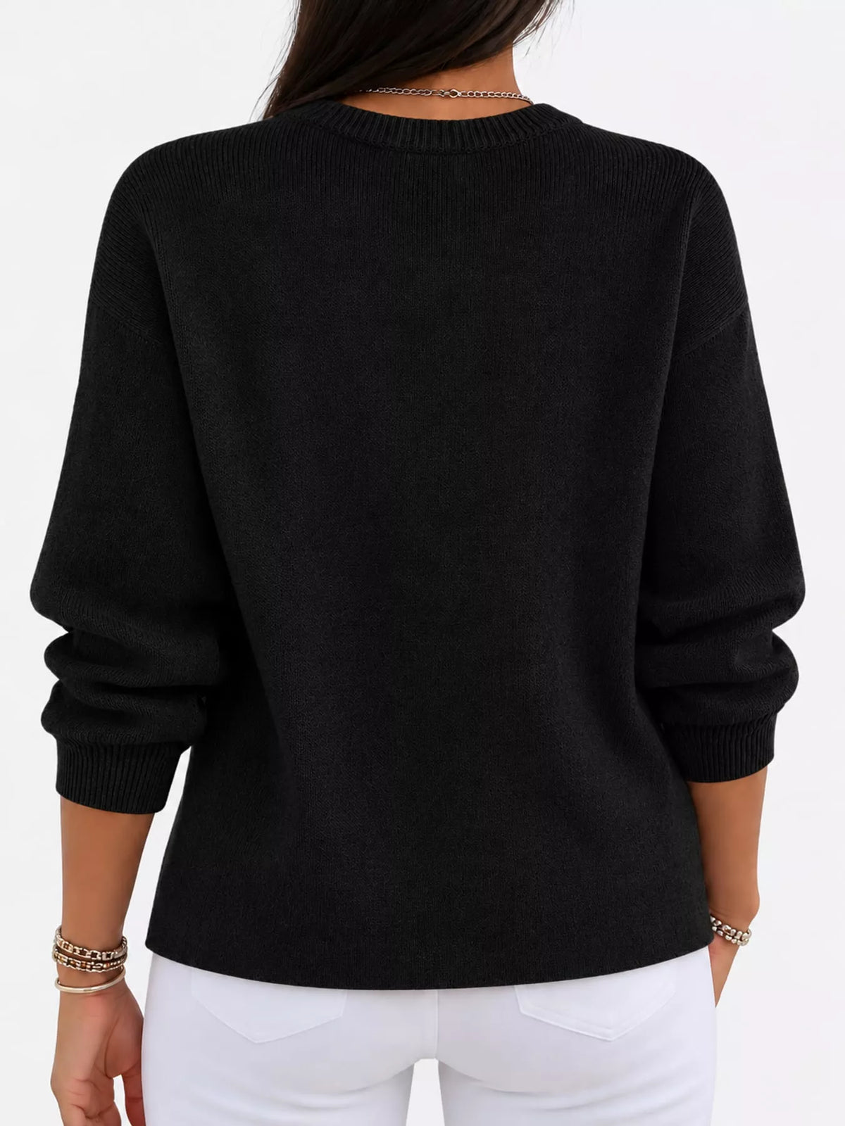 Black crew neck sweater, back view