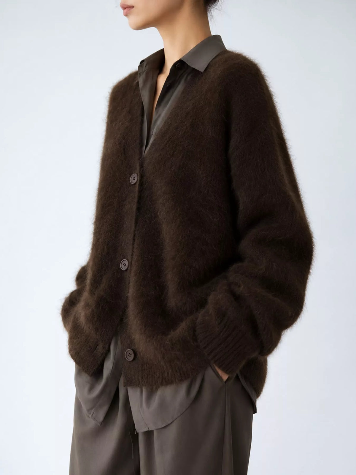 Brown fuzzy v-neck button-down cardigan, side view