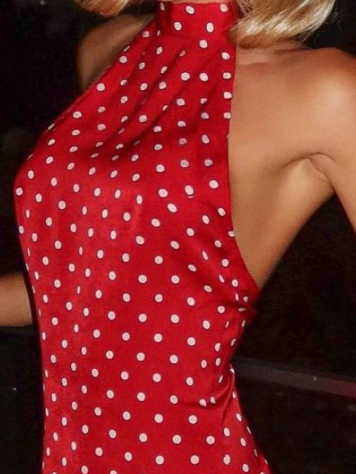 Red and white polka dot halter neck mini dress, detail view