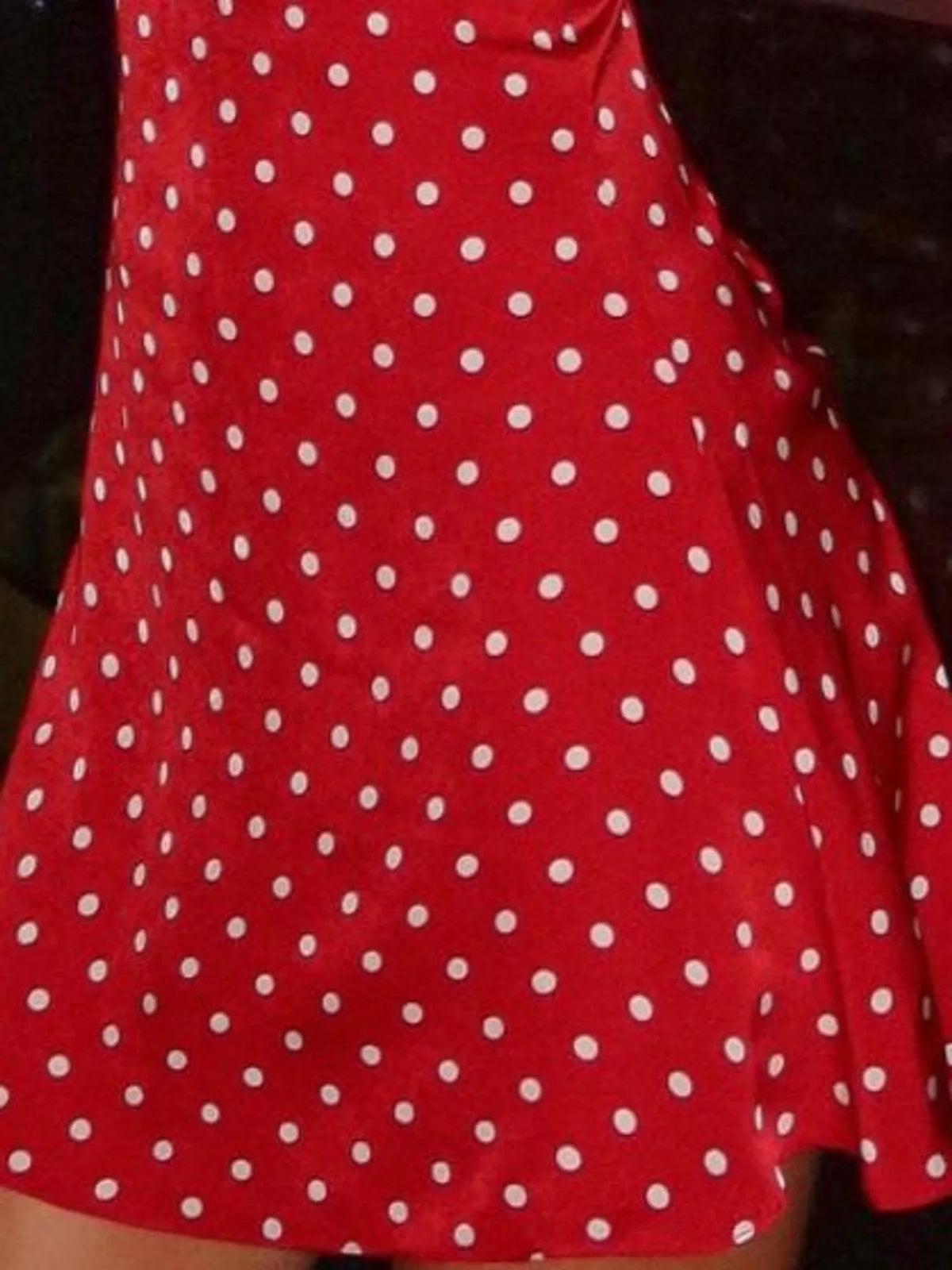 Red and white polka dot halter neck mini dress, detail view