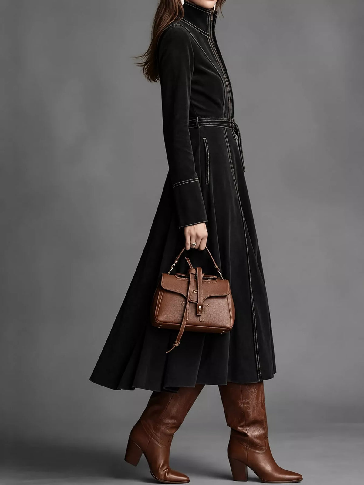 Black zipper front midi dress, side view
