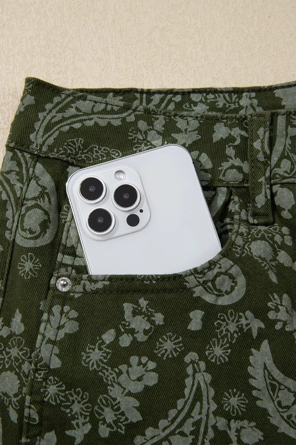 Green paisley print harem denim pants, pocket detail
