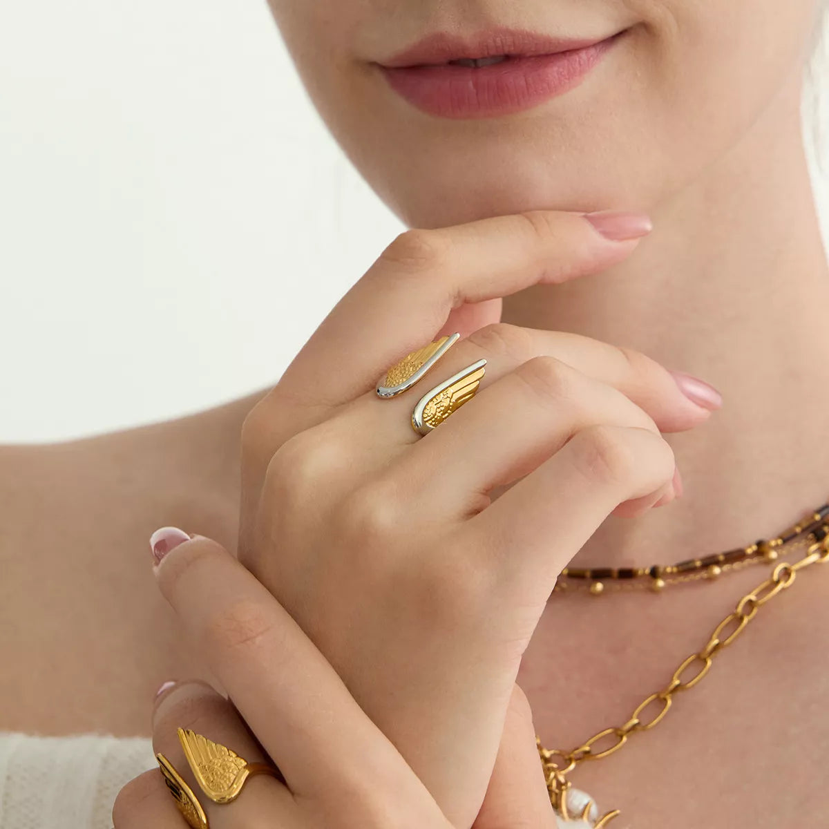 Open Wing Ring, shown worn