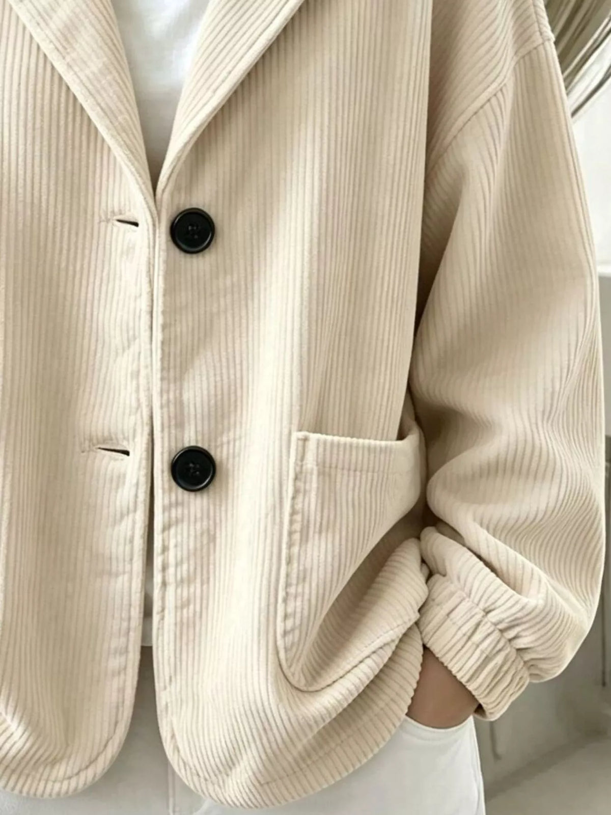 Women's Corduroy Button Up Hooded Jacket in cream — pocket detail view
