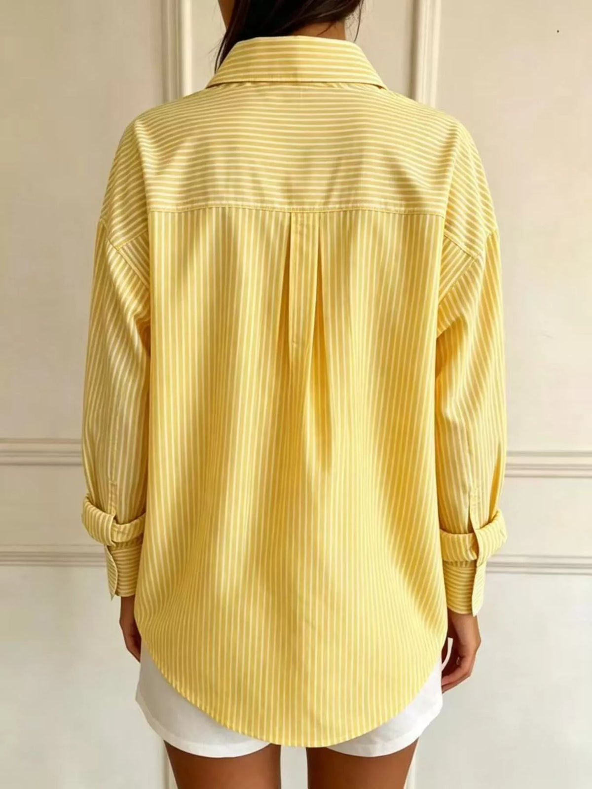 Yellow striped long sleeve shirt, back view