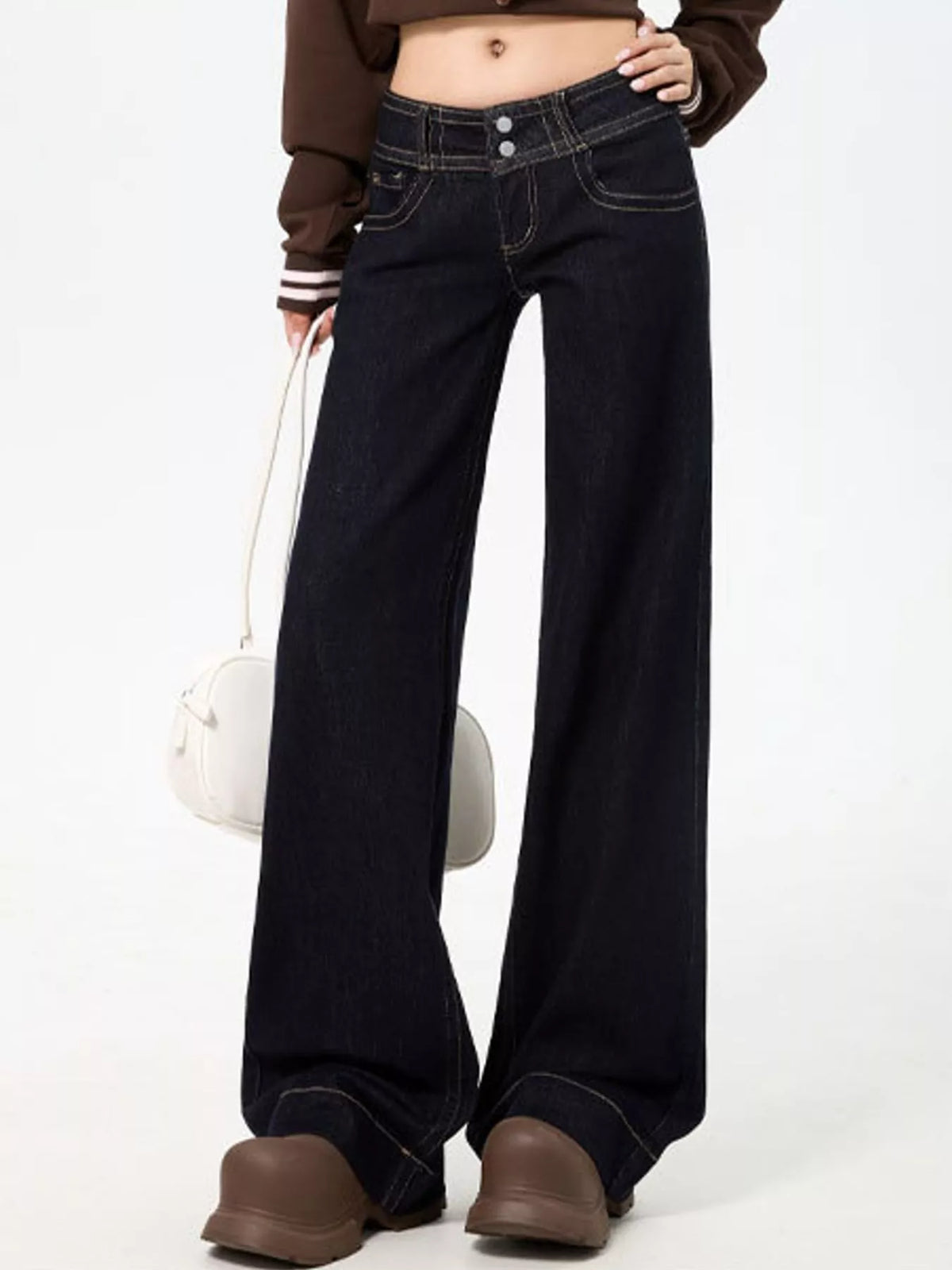 Black low-rise wide-leg jeans — front view