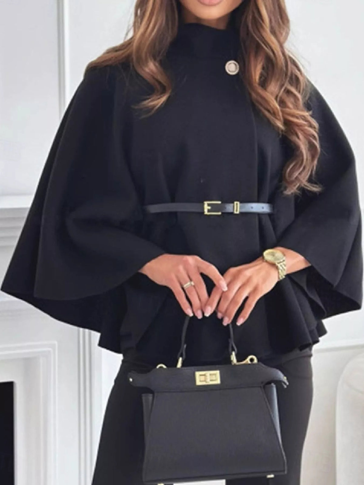 Belted Mock Neck Cape in black, front view