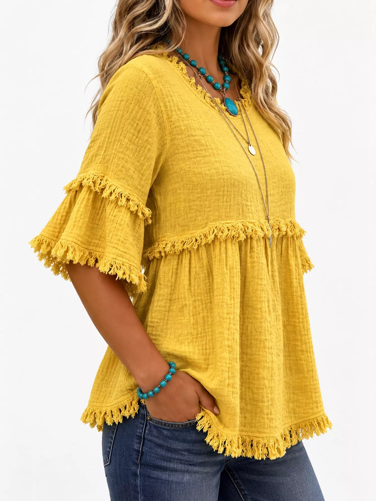 Yellow frayed edge textured blouse, side view