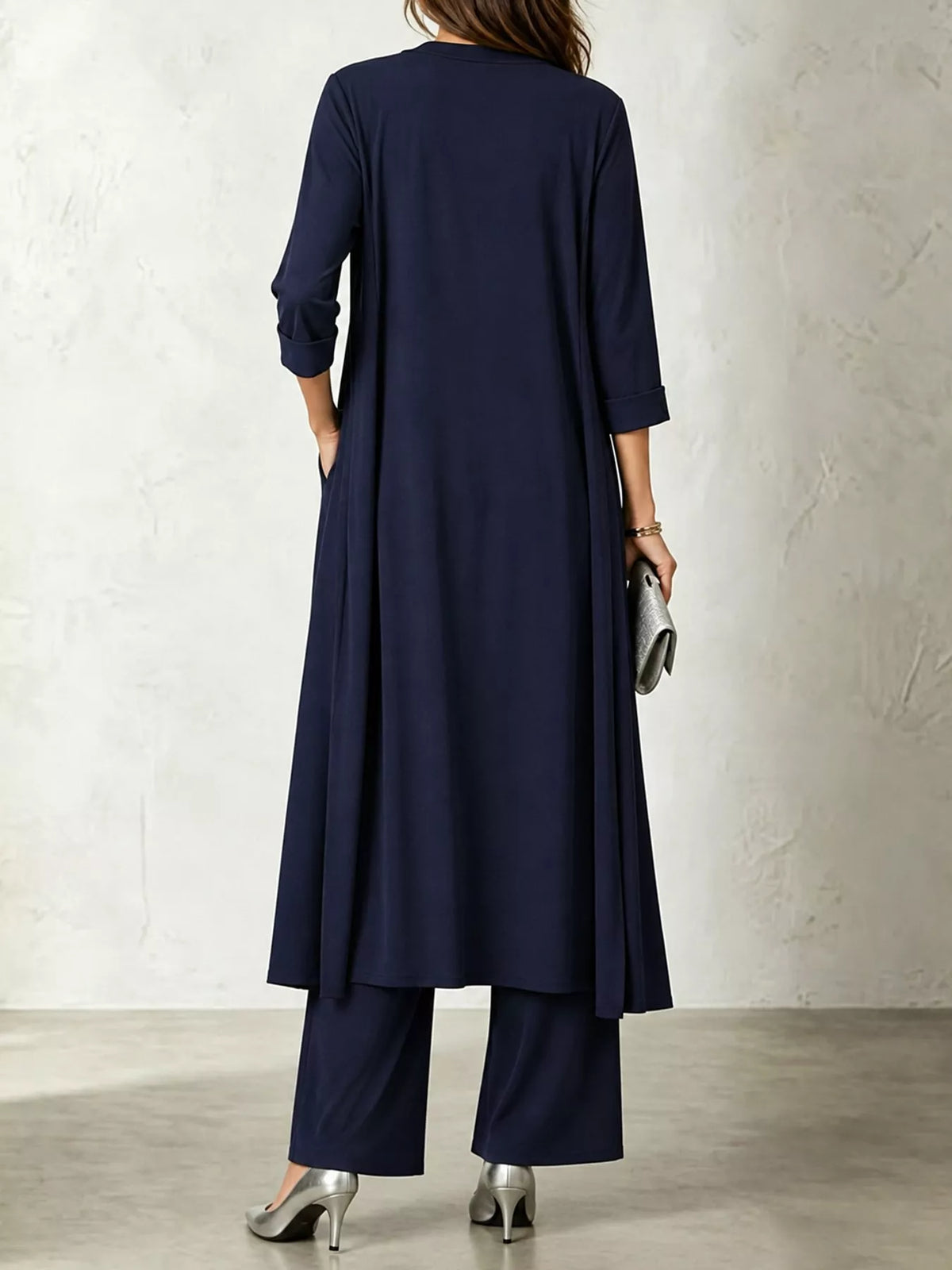 Navy blue cowl neck top, cardigan and pants set, back view