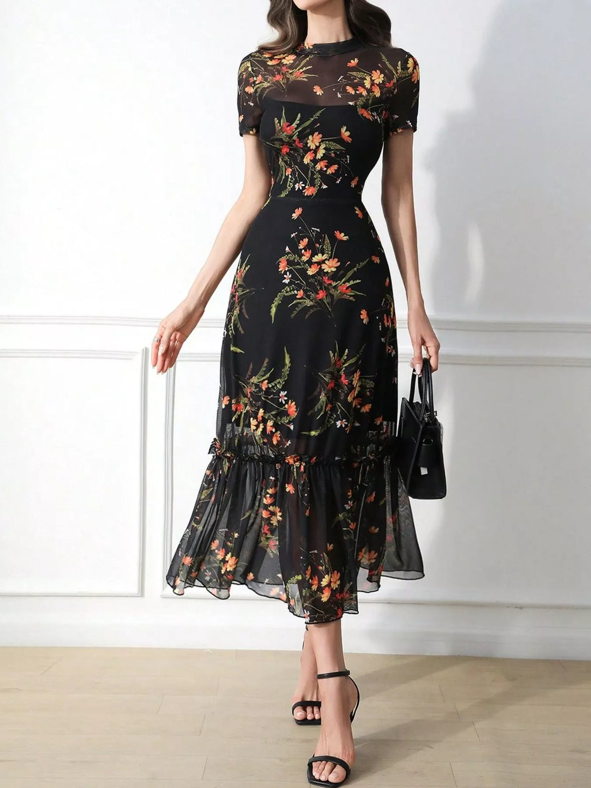 Black floral sheer-overlay midi dress with ruffle hem
