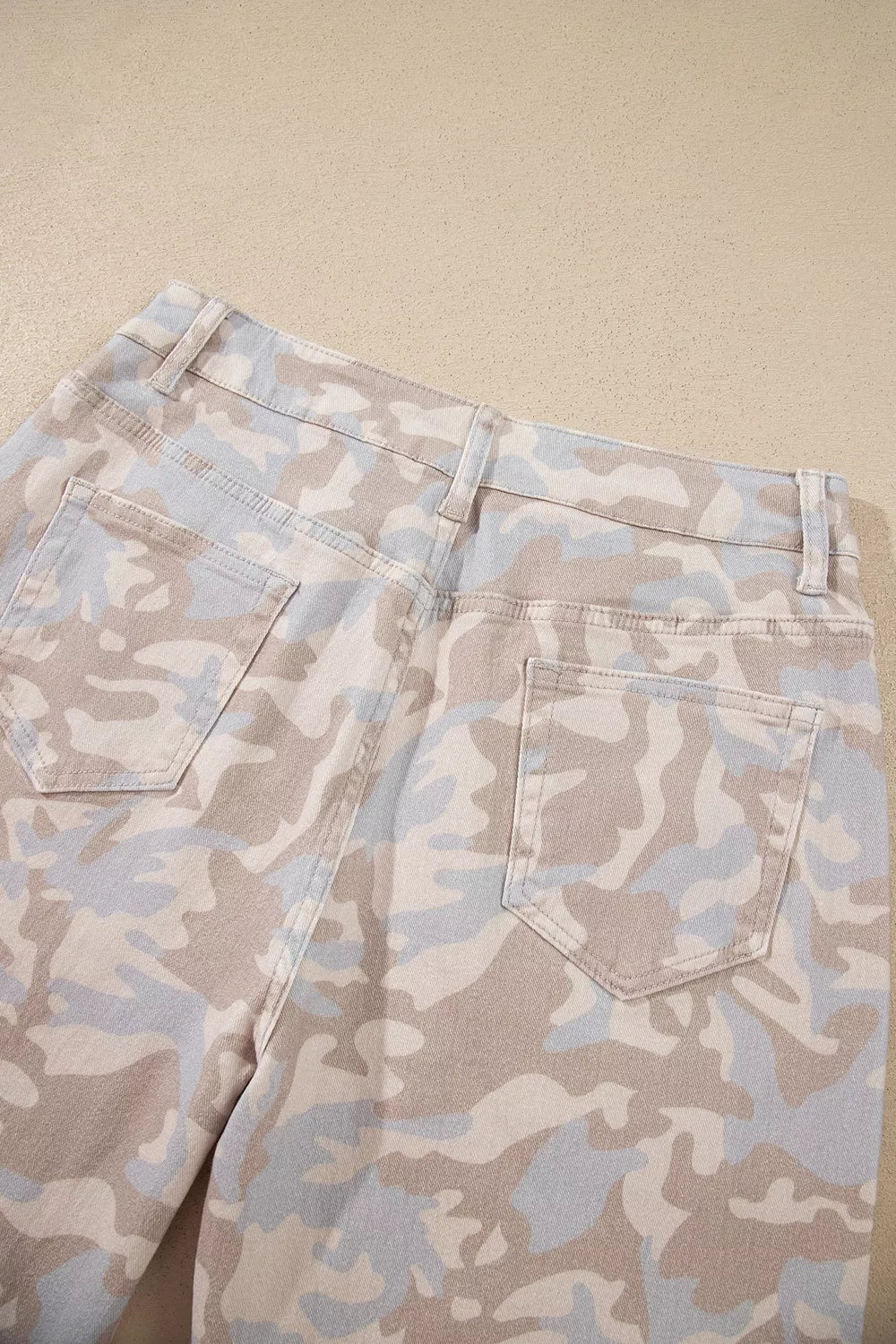 Beige camouflage barrel jeans, back waist detail