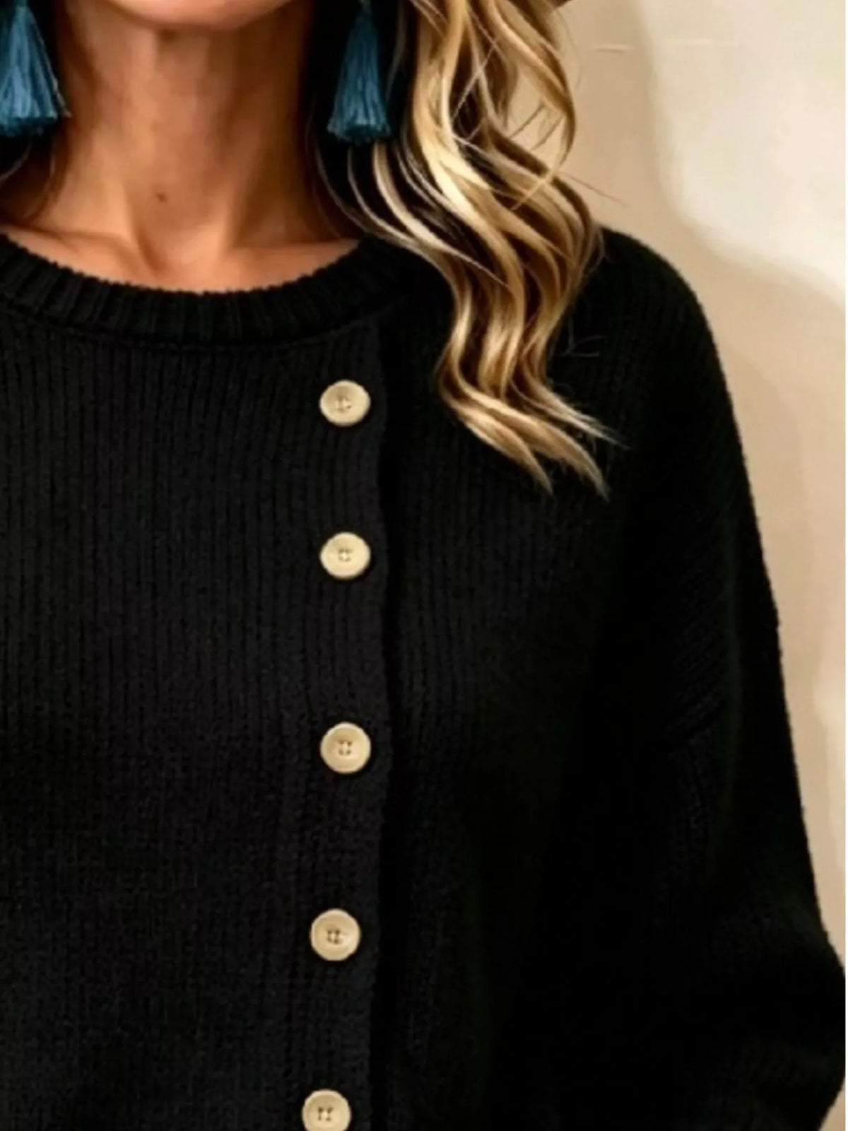 Women's Decorative Button Round Neck Sweater in black — button detail view
