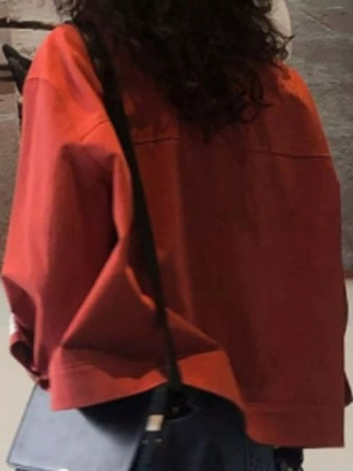 Red zip-up dropped shoulder jacket, back view