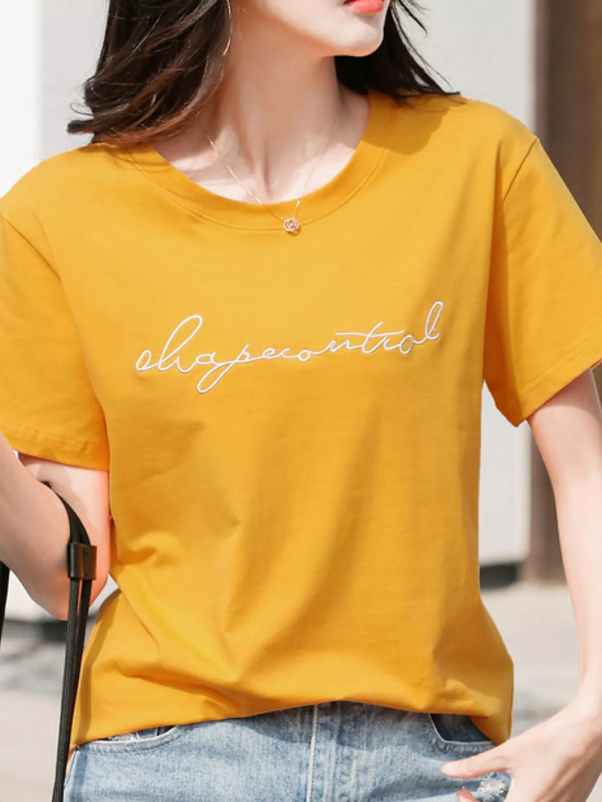 Yellow letter embroidered round neck t-shirt