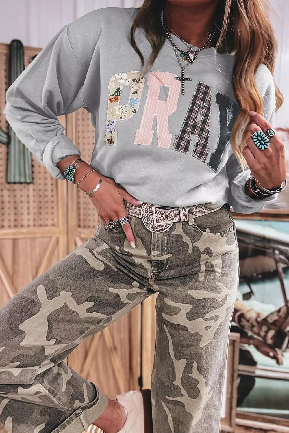 Gray floral and plaid PRAY patch sweatshirt, front styled view