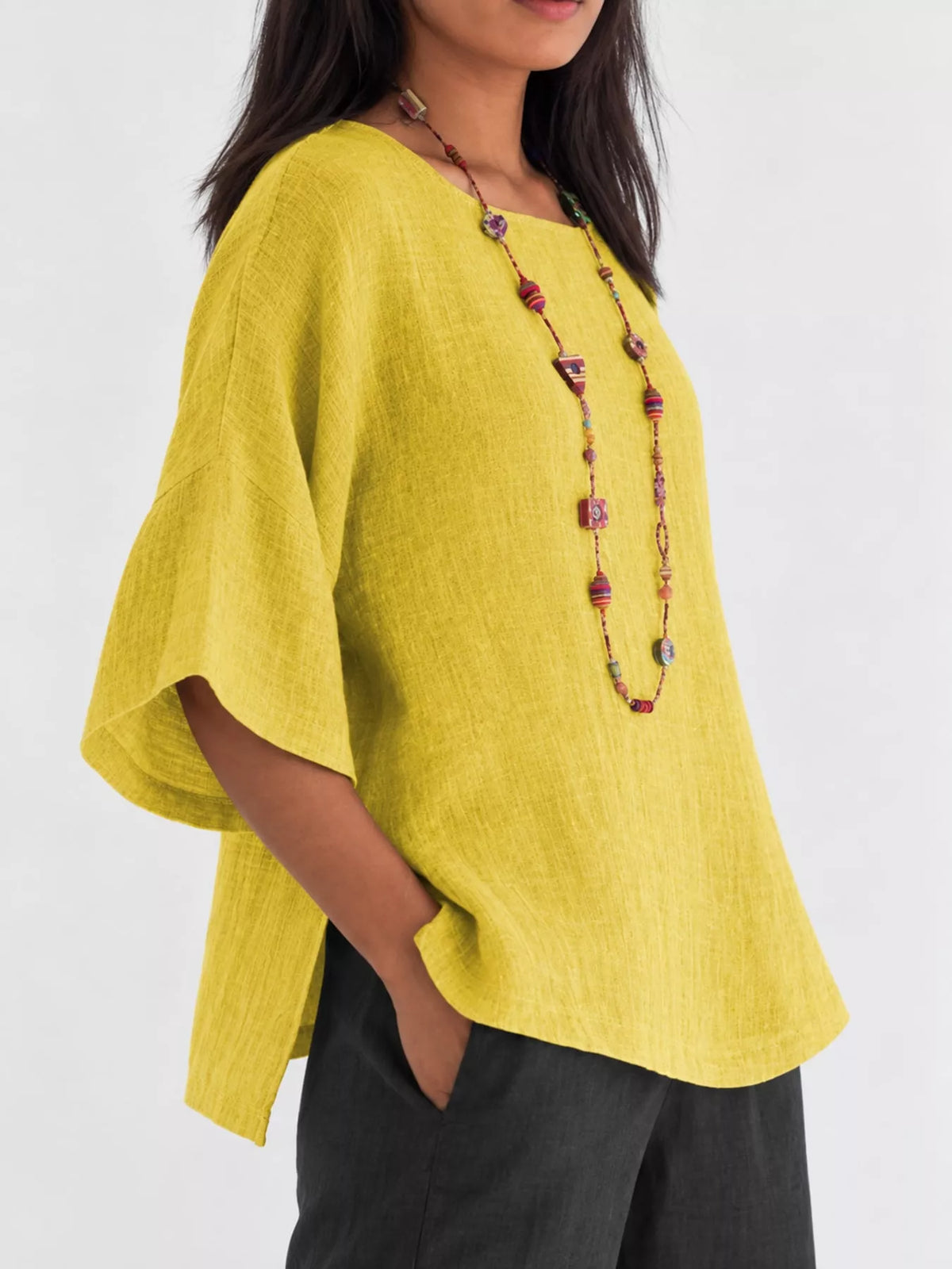 Slit blouse, yellow side