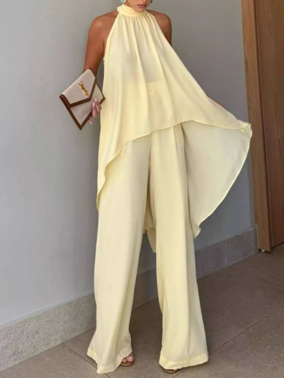Pale Yellow High-Low Sleeveless Top & Wide-Leg Pants Set front movement view