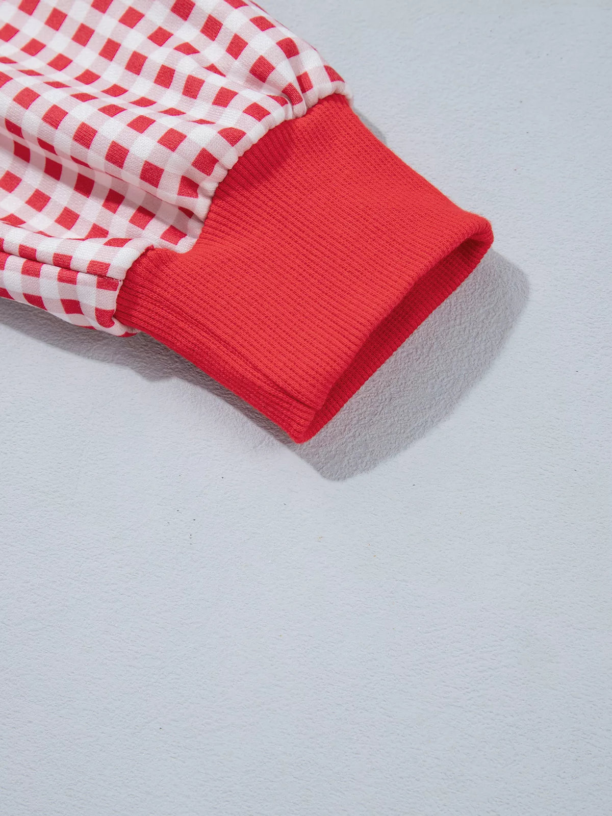 Red gingham sleeve slogan sweatshirt, detail view
