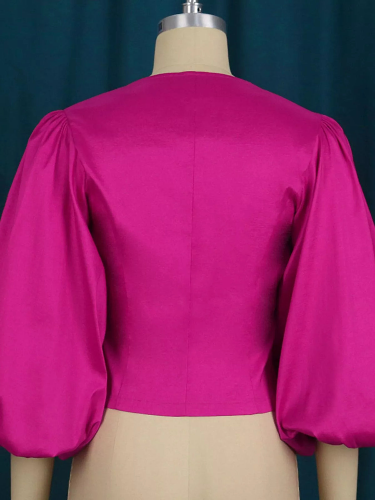 Fuchsia double-breasted puff sleeve blouse, back view