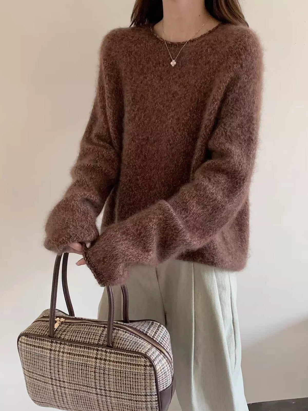 Round neck long sleeve sweater, front view on model