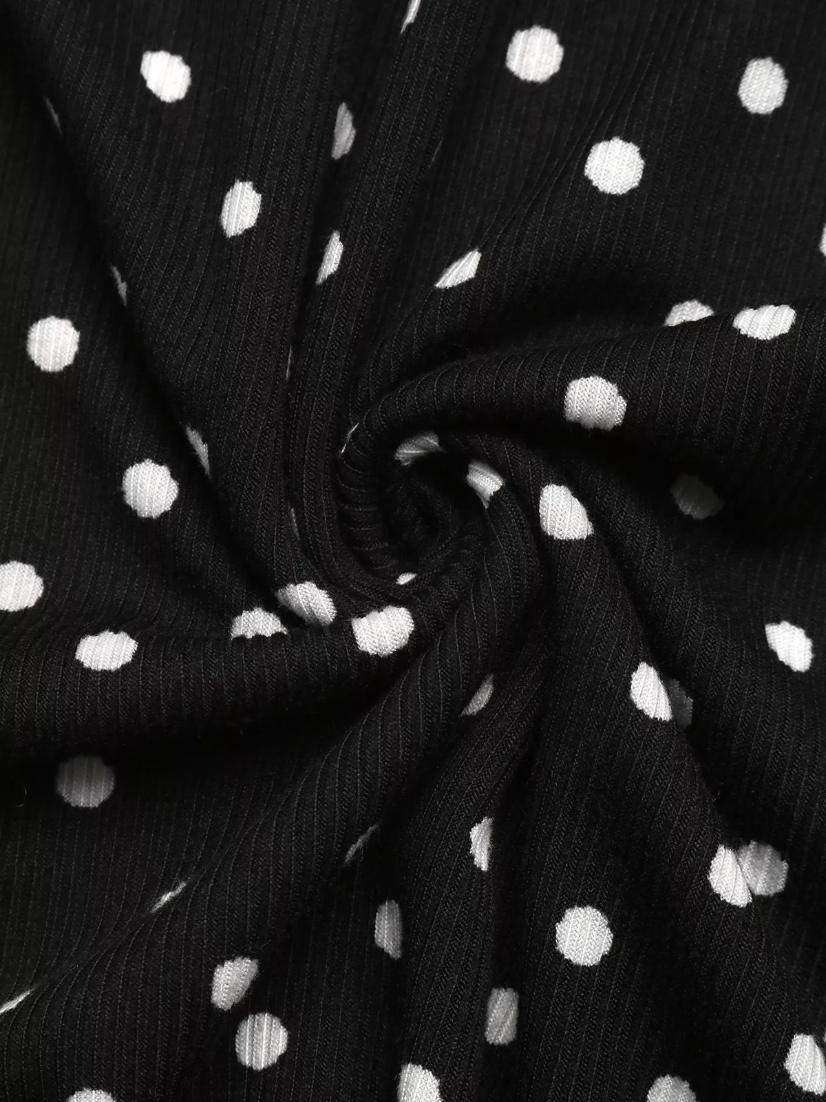 Black polka dot flounce sleeve mini dress, fabric close-up