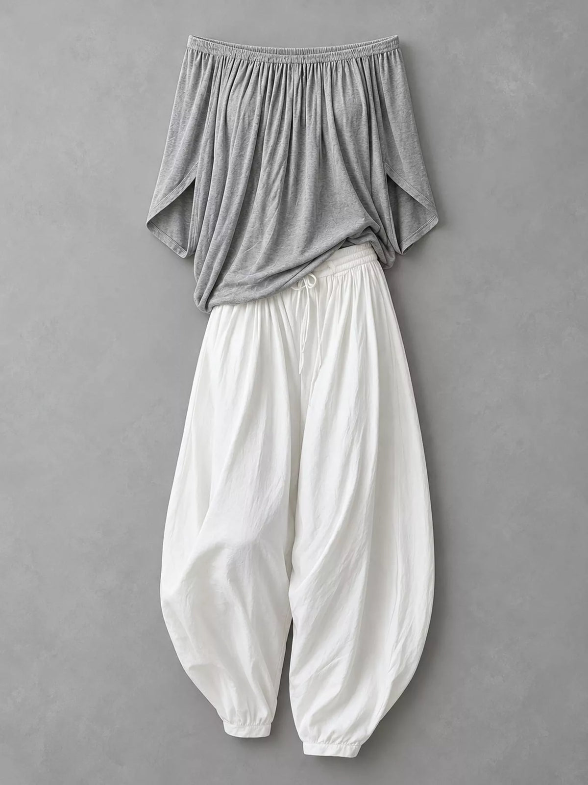 Gray top and white pants off-shoulder top and wide-leg harem pants set — front view