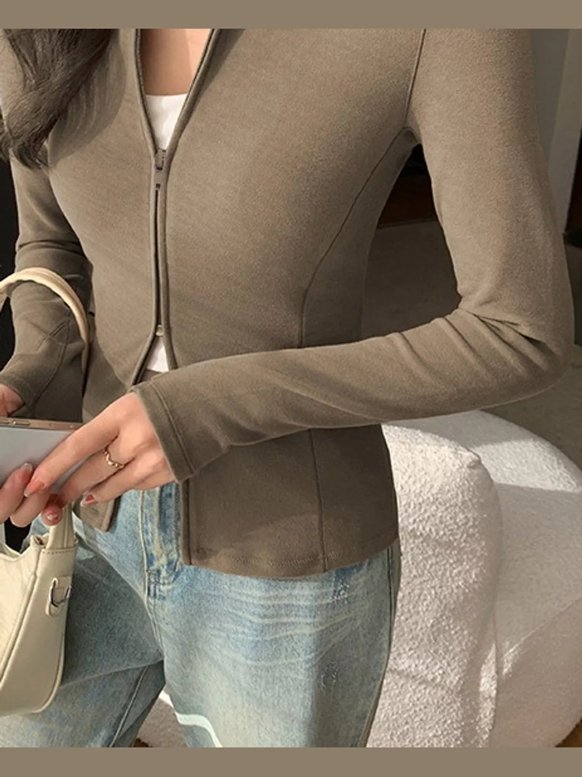 Taupe slim-fit zip-up long sleeve jacket — design and construction details