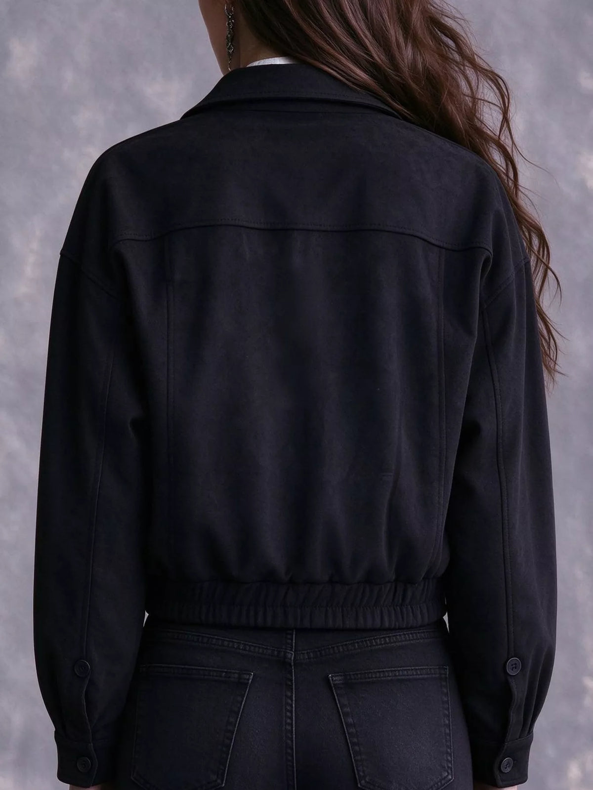 Black zip-up bomber jacket, back view
