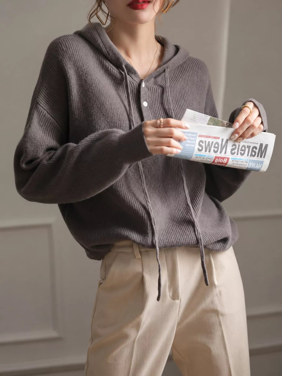 Hooded long sleeve sweater, front view on model