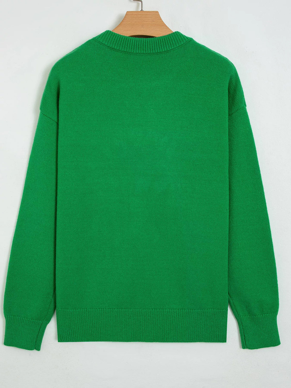 Christmas patch sweater, green hanging back